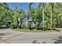 Beautiful home with lush landscaping and circular driveway at 183 Parsons Rd, Longwood, FL 32779
