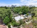 Stunning aerial view showcasing the home's proximity to the city skyline and lush green surroundings at 548 S Hyer Ave # 1, Orlando, FL 32801