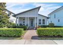 Charming single-story home featuring a modern design and well-manicured landscaping at 8518 Nemours Pkwy, Orlando, FL 32827
