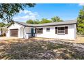 Lovely one-story home featuring a garage, well-kept lawn, and delightful curb appeal at 1859 Matterhorn Dr, Orlando, FL 32818
