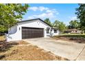 Charming house boasting a garage and a well-maintained lawn at 1859 Matterhorn Dr, Orlando, FL 32818