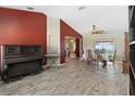 Open-concept living room with gorgeous floors and abundant natural light at 2407 Accord Ter, Kissimmee, FL 34758