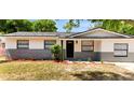 Charming single-story home with fresh exterior paint and manicured landscaping at 3397 Janet St, Apopka, FL 32712