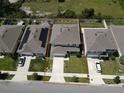 Aerial view of the home in a community with an outlined property line at 5350 Pine Lilly Dr, St Cloud, FL 34771