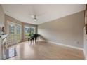 Inviting living room with a fireplace, large windows offering natural light and scenic view at 148 Olive Tree Cir # 148, Altamonte Springs, FL 32714