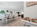 Open living space combines dining and living areas with lots of natural light at 15411 Taurus Ct, Mascotte, FL 34753