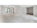 Bright living room showcasing neutral colors and an open layout at 2666 Derbyshire Rd, Maitland, FL 32751