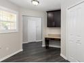Hallway featuring built-in desk space and fresh paint at 6245 Sleepy Hollow Dr, Orlando, FL 32810