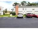Well-maintained parking lot with clearly marked spaces for residents and visitors at 1108 Northlake Dr # 1108, Sanford, FL 32773