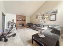 Bright living room with a cozy brick fireplace, neutral color palette, and stylish decor for comfortable living at 6047 Shore Line Dr, Orlando, FL 32819