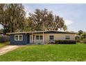 Charming single-story home with a well-manicured lawn and covered entryway at 826 Cherokee Cir, Sanford, FL 32773