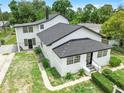 Overhead angle of the property highlighting the clean roofline, well-maintained landscaping, and inviting front yard at 161 Bolender Rd, Auburndale, FL 33823