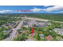 Aerial view of a neighborhood with the property and I4/434 Intersection clearly visible at 102 Ichabod Trl, Longwood, FL 32750