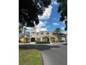 Spacious, updated community clubhouse featuring ample parking, well-manicured landscaping, and attractive architectural details at 1057 S Hiawassee Rd # 1913, Orlando, FL 32835