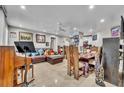 Bright living room and dining area featuring tile flooring and ceiling fan for comfortable living at 4740 Walden Cir # 28, Orlando, FL 32811
