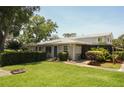 Attractive single-story home with a well-kept lawn and mature trees offering ample shade at 610 Heatherton Vlg # 610, Altamonte Springs, FL 32714