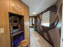 Amusing hallway with vintage game machine and funky decoration at 6165 Carrier Dr # 1801, Orlando, FL 32819