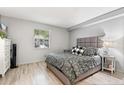 Comfortable bedroom featuring a well-dressed bed and a window for natural light at 141 Lewfield Circle # 141, Winter Park, FL 32792