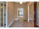 Welcoming foyer featuring tile flooring and an open view into the home's living spaces at 1947 Broadleaf Ct, Windermere, FL 34786