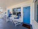 Inviting condo patio with seating, perfect for relaxing and enjoying the outdoor view at 935 S Atlantic Ave # 244, Daytona Beach, FL 32118