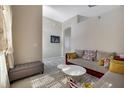 Comfortable living room featuring a neutral color palette, plush seating, and stylish decor at 1429 Carey Glen Cir, Orlando, FL 32824