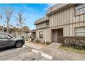 Two-story condo unit with front entrance landscaping and assigned parking at 2826 Ne 7Th St, Ocala, FL 34470