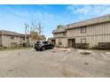Two-story condo with assigned parking spots and mature trees at 2826 Ne 7Th St, Ocala, FL 34470