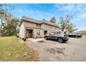 Two-story condo unit with front yard landscaping and designated parking at 2826 Ne 7Th St, Ocala, FL 34470