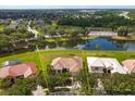 Aerial view of a beautiful single-Gathering home with a lovely pond view at 4034 Bougainvillea Pl, Kissimmee, FL 34746