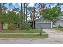 Charming single-story home with a well-maintained front yard and attached garage at 885 Little Bend Rd, Altamonte Springs, FL 32714