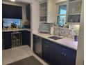 Modern kitchen features sleek countertops, stainless steel appliances, and ample cabinet space for convenient storage at 488 Golf Blvd, Daytona Beach, FL 32118