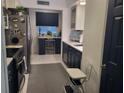 Well-appointed kitchen with stainless steel appliances, stylish countertops, and a convenient layout, perfect for cooking at 488 Golf Blvd, Daytona Beach, FL 32118