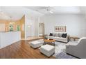 Bright living room boasts vaulted ceilings, recessed lighting, and neutral decor at 5382 Sw 84Th Pl, Ocala, FL 34476