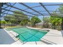 Enjoy the Florida sunshine in this screened-in pool with a spacious deck, perfect for entertaining and relaxation at 957 Yellow Rose Dr, Orlando, FL 32818