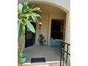 Inviting front porch area with cozy seating, creating a welcoming entrance to the home at 1252 Lake Willisara Cir # Ge, Orlando, FL 32806