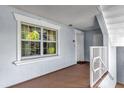 Condo entryway with window, showing a well-lit corridor with neutral tones and easy access at 1100 Sunset View Cir # 204, Reunion, FL 34747