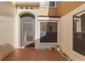 Charming covered porch with tiled flooring and a view of the front entrance at 2926 Claremont Ct # Ge, Orlando, FL 32822