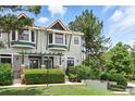 Inviting townhome boasts lush landscaping and meticulous upkeep, creating a picturesque and welcoming facade at 14501 Damai Ln, Orlando, FL 32821
