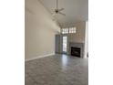 Bright living room with fireplace and updated tile flooring at 1486 Farrindon Cir, Lake Mary, FL 32746