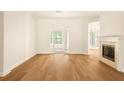 Large living room with hardwood flooring and ample natural light at 3381 Regal Crest Dr, Longwood, FL 32779