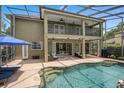Inviting pool with a relaxing patio and outdoor seating area at 490 Wekiva Preserve Dr, Apopka, FL 32712