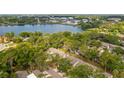 Community aerial view featuring beautiful tree coverage and lake views at 411 Meadowood Blvd, Fern Park, FL 32730