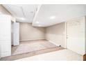 A spacious finished basement with new carpet sits ready to be transformed into a rec room or home office at 3304 Vancouver Ave, Deltona, FL 32738