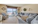 Cozy living room with ocean view and comfortable seating at 3641 S Atlantic Ave # 110, Daytona Beach, FL 32118