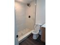 Elegant bathroom featuring a new shower with beautiful tile and stylish fixtures at 5416 Vance Ave, Orlando, FL 32810