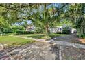 Charming home with mature trees and well-manicured lawn at 171 Cortland Ave, Winter Park, FL 32789