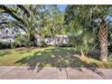 Charming home with mature trees and well-manicured lawn at 171 Cortland Ave, Winter Park, FL 32789