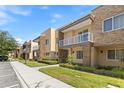 Attractive multi-level townhomes boast private balconies, stone accents, and a well-maintained community at 3149 Brasilia Ave, Kissimmee, FL 34747