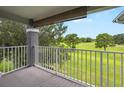 View from the balcony, showcasing the lush green golf course at 13917 Fairway Island Dr # 931, Orlando, FL 32837