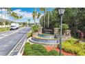 Cumbrian Lakes community entrance sign with lush landscaping and a decorative water feature at 4611 Cumbrian Lakes Dr, Kissimmee, FL 34746